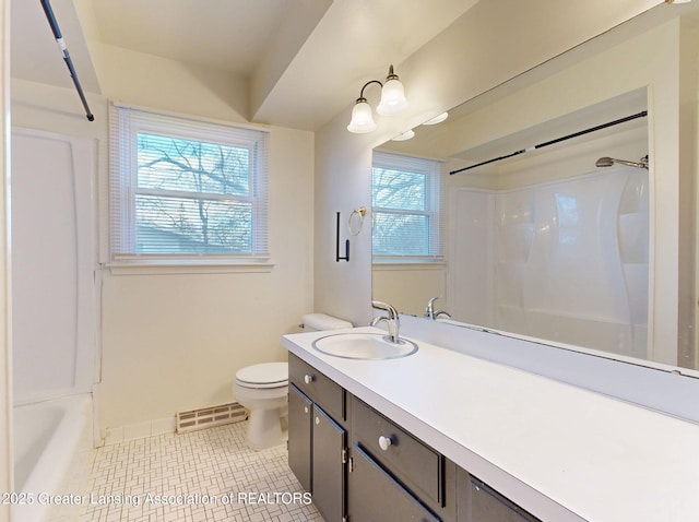 full bathroom with toilet, vanity, tile patterned flooring, baseboards, and walk in shower