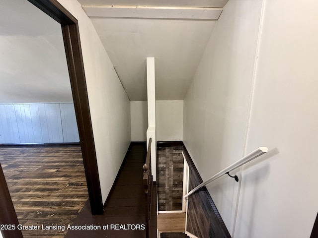 stairway with wood finished floors