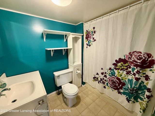 full bathroom featuring toilet, vanity, a shower with shower curtain, and tile patterned floors