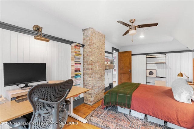 bedroom featuring ceiling fan and wood finished floors