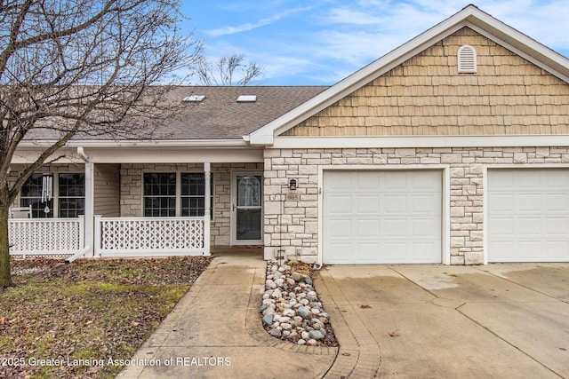 ranch-style house with an attached garage, driveway, a porch, and a shingled roof