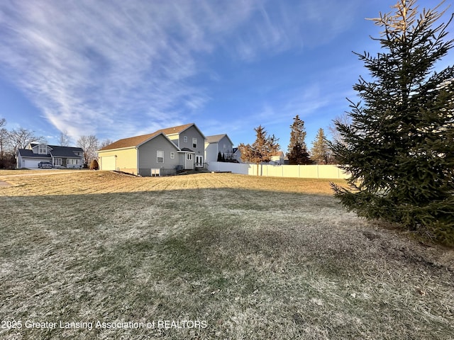 view of yard with fence