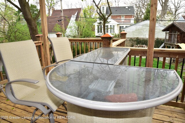 603 N Harrison Rd, East Lansing, MI 48823 - wooden deck with outdoor dining area
