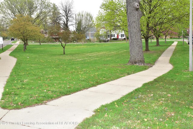 603 N Harrison Rd, East Lansing, MI 48823 - view of property's community with a lawn