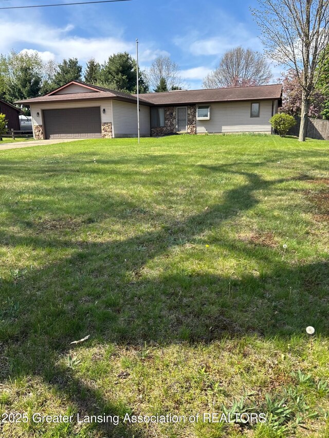 16495 F Dr N, Marshall, MI 49068 - single story home with a front lawn, stone siding, and a garage