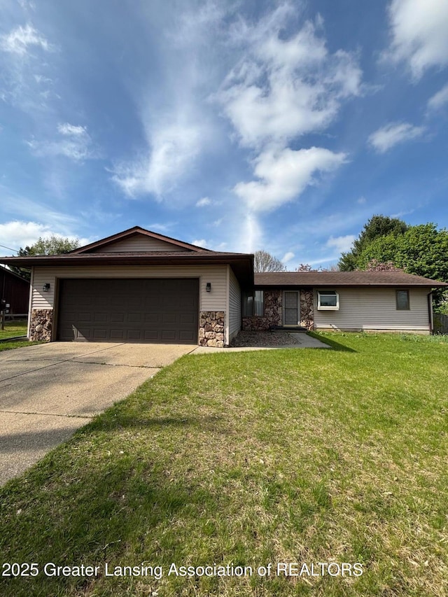 16495 F Dr N, Marshall, MI 49068 - ranch-style house with a garage, a front lawn, stone siding, and concrete driveway