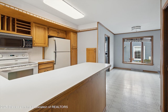 kitchen with white appliances, tasteful backsplash, baseboards, light countertops, and light floors