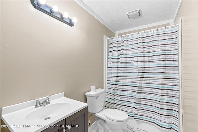 bathroom featuring visible vents, a textured ceiling, toilet, and vanity