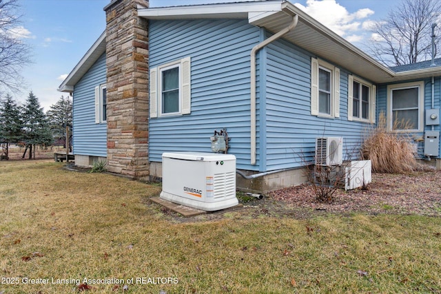 view of home's exterior featuring ac unit, a lawn, and a chimney