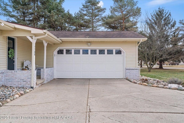 garage with driveway