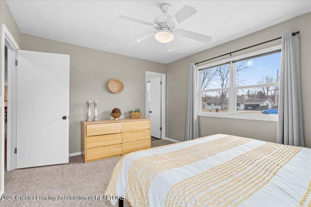 bedroom featuring carpet, ceiling fan, and baseboards