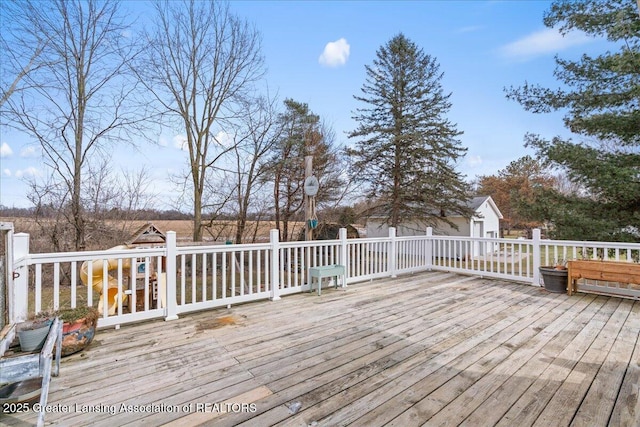 wooden terrace with an outdoor structure