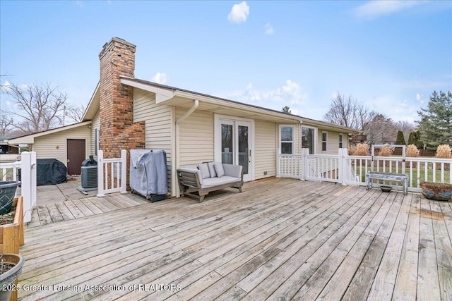 deck featuring grilling area