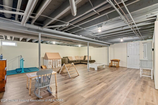 basement with wood finished floors