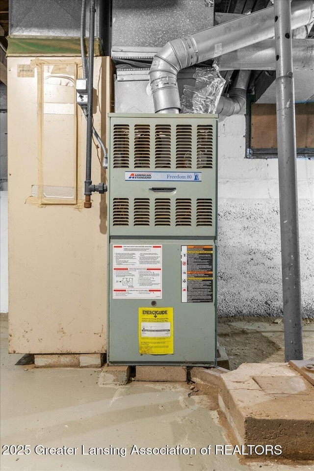 utility room with heating unit