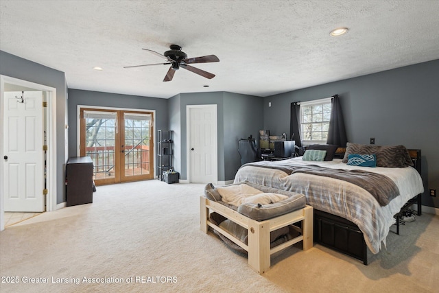 bedroom with access to outside, french doors, carpet flooring, and baseboards