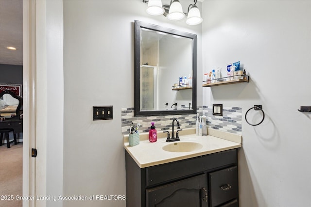 bathroom with backsplash and vanity