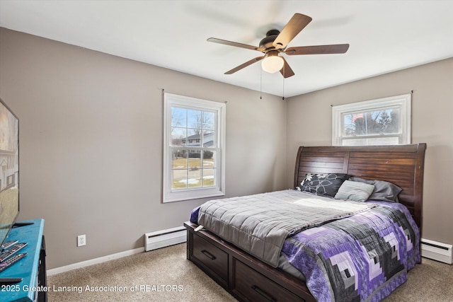 bedroom featuring a ceiling fan, baseboards, light carpet, and baseboard heating