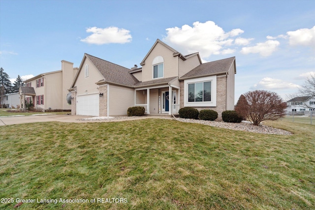 traditional-style home featuring an attached garage, concrete driveway, brick siding, and a front yard