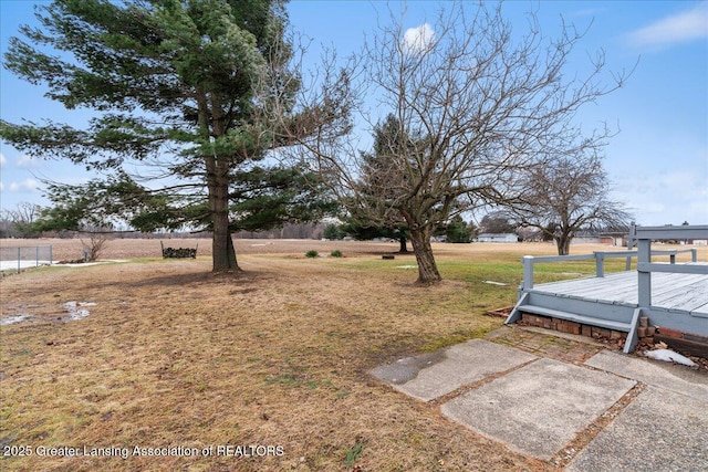 view of yard featuring a deck