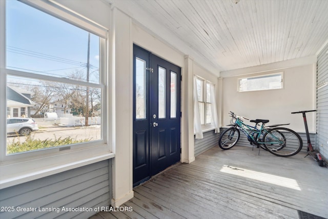 foyer entrance featuring wooden ceiling and wood-type flooring