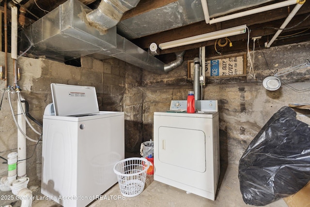 laundry area with laundry area and independent washer and dryer