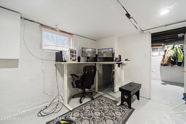 office area with concrete flooring