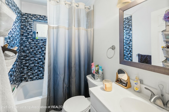 bathroom featuring shower / tub combo, vanity, and toilet