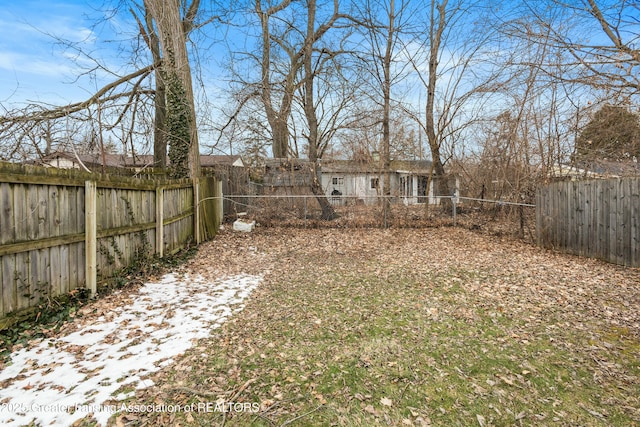 view of yard featuring a fenced backyard