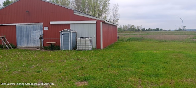 11173 W Bennett Rd, Sumner, MI 48889 - view of pole building with a yard