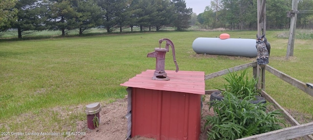 11173 W Bennett Rd, Sumner, MI 48889 - exterior view of propane tank