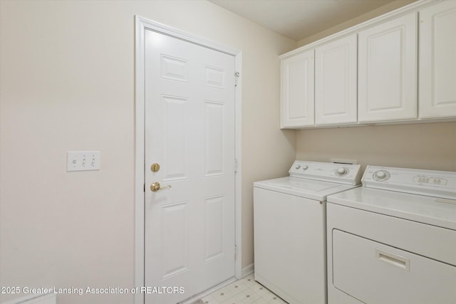 washroom with cabinet space, light floors, and independent washer and dryer