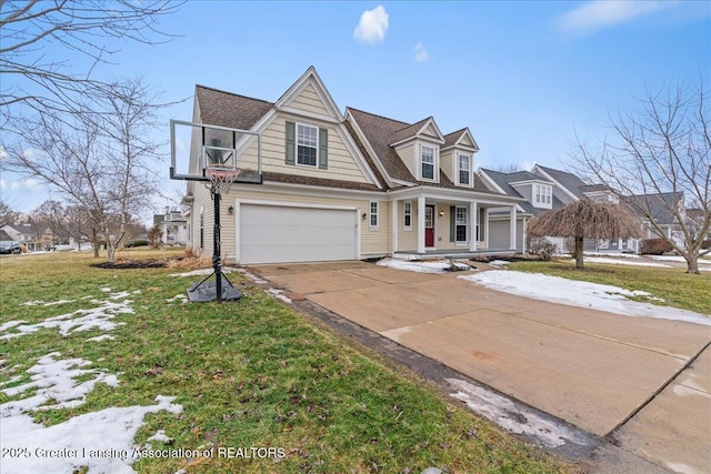 view of front of property featuring an attached garage, covered porch, driveway, and a front lawn