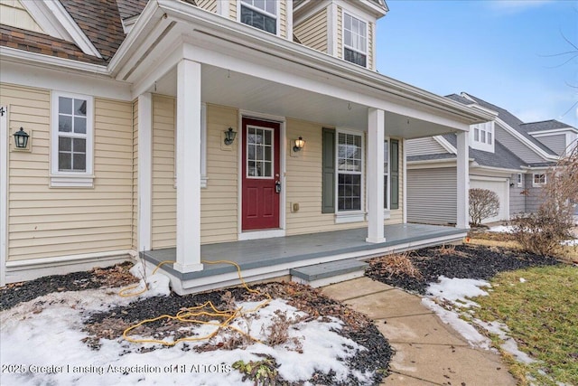 doorway to property with covered porch