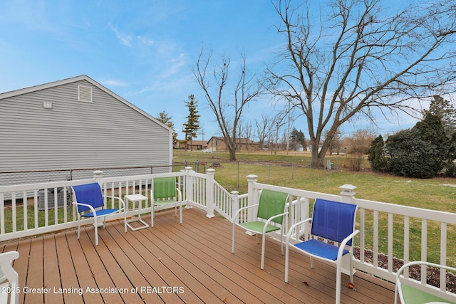 deck featuring a yard