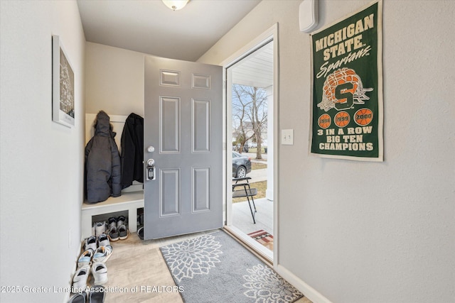 interior space featuring baseboards