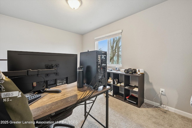 home office featuring carpet and baseboards