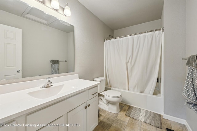 full bathroom with toilet, shower / tub combo with curtain, wood finished floors, and vanity