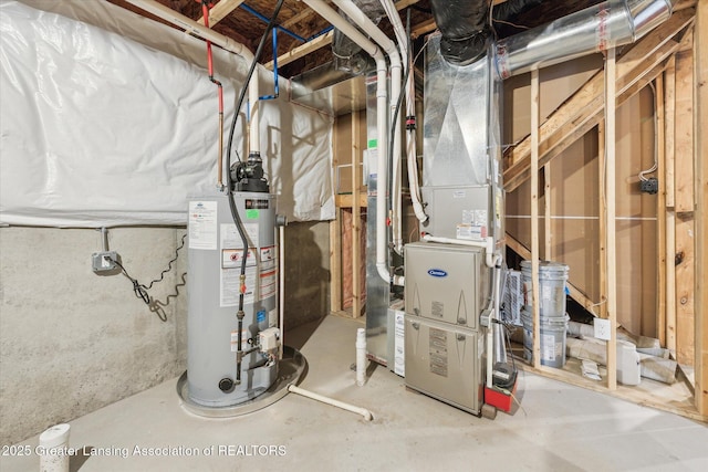 utility room featuring water heater