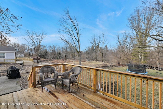 deck with a trampoline