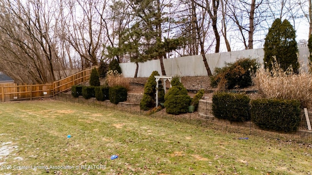 view of yard featuring fence