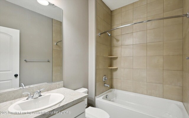 full bath featuring toilet, vanity, and bathing tub / shower combination