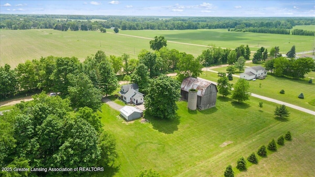 9840 W Herbison Rd, Eagle, MI 48822 - overview of rural landscape with a tree filled landscape