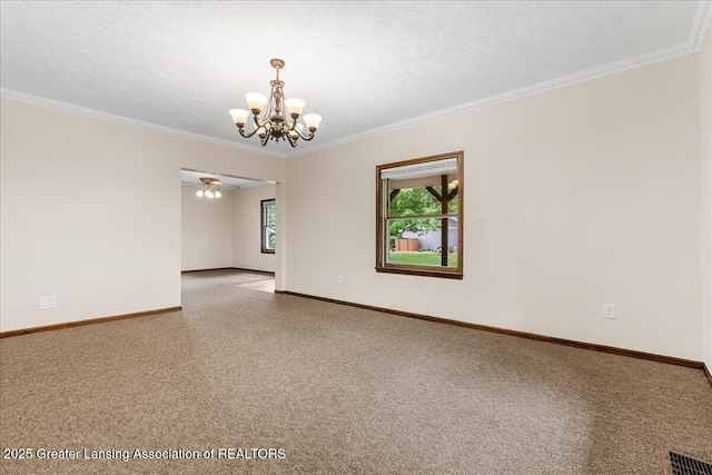 9840 W Herbison Rd, Eagle, MI 48822 - carpeted empty room featuring a chandelier, crown molding, ceiling fan, and a textured ceiling