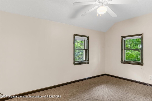 9840 W Herbison Rd, Eagle, MI 48822 - empty room with carpet, lofted ceiling, and ceiling fan