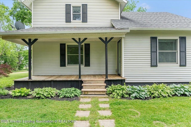 9840 W Herbison Rd, Eagle, MI 48822 - view of front facade featuring a porch, roof with shingles, and a front yard