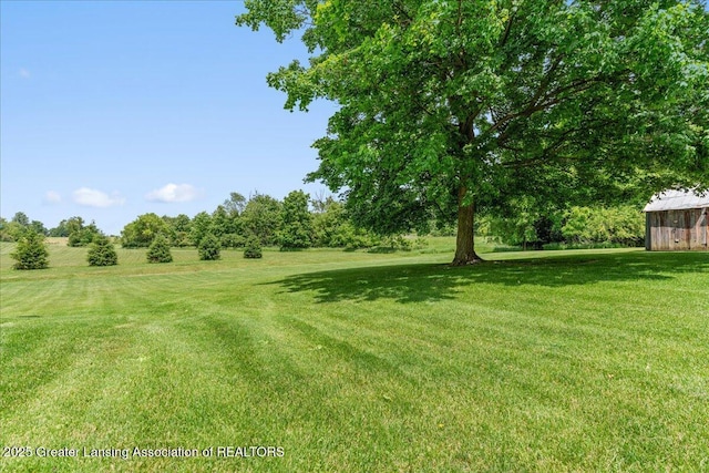 9840 W Herbison Rd, Eagle, MI 48822 - view of grassy yard