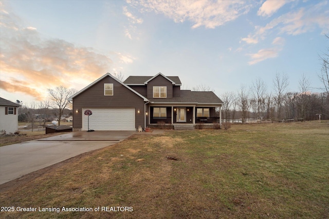 traditional-style home featuring a porch, driveway, an attached garage, and a lawn