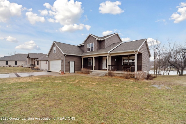 traditional home with driveway, a garage, roof with shingles, covered porch, and a front yard