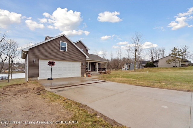 view of home's exterior featuring a garage, covered porch, a lawn, and driveway